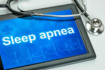 A tablet with the words Sleep Apnea and a stethoscope.